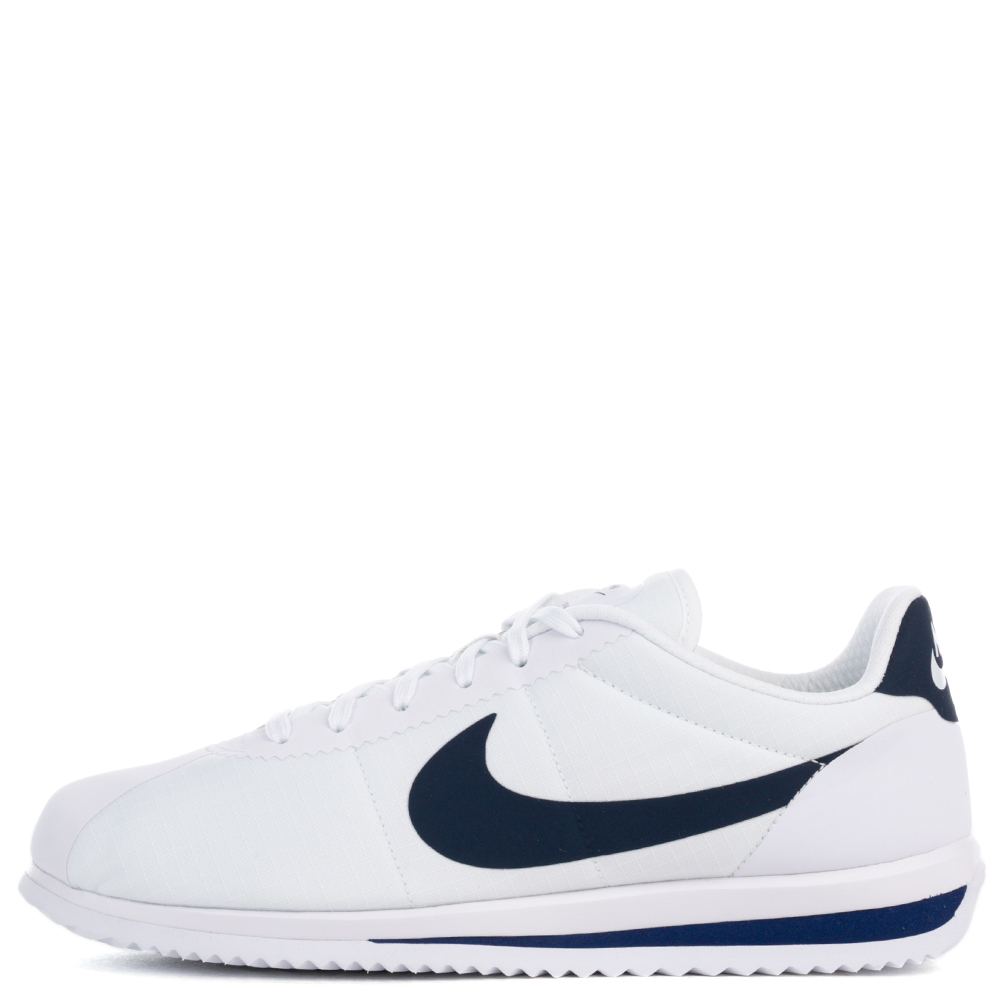 Navy blue and hot sale white nike cortez