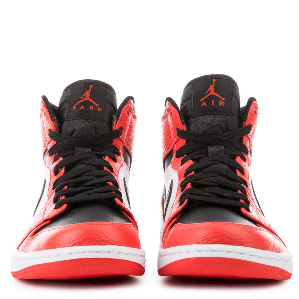 orange white and black jordans