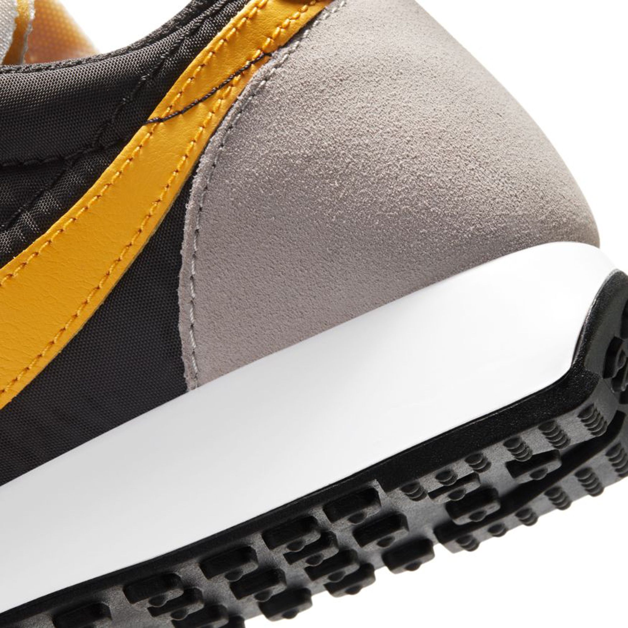 nike tailwind 79 university gold