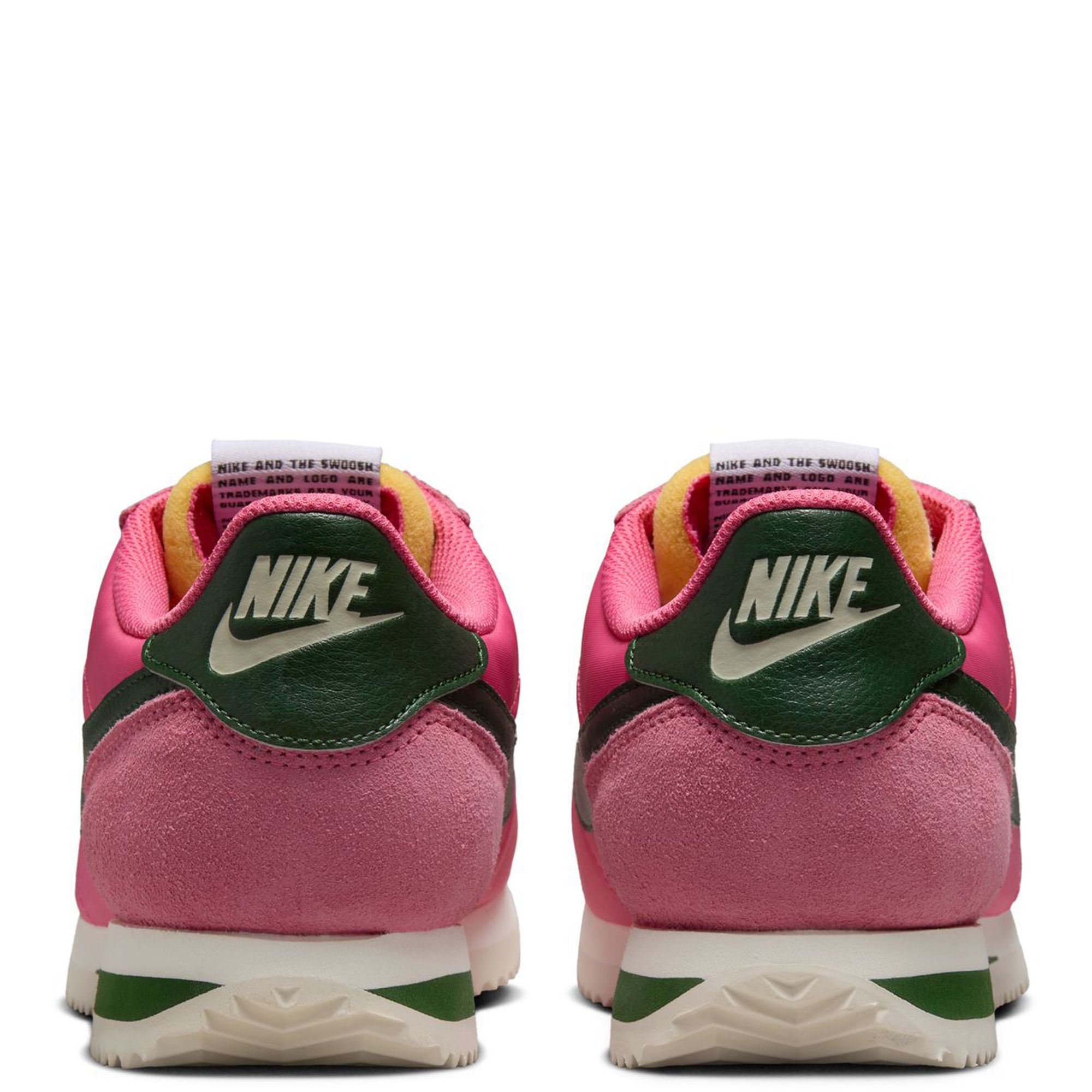 nike pink with swoosh suede cortez trainers