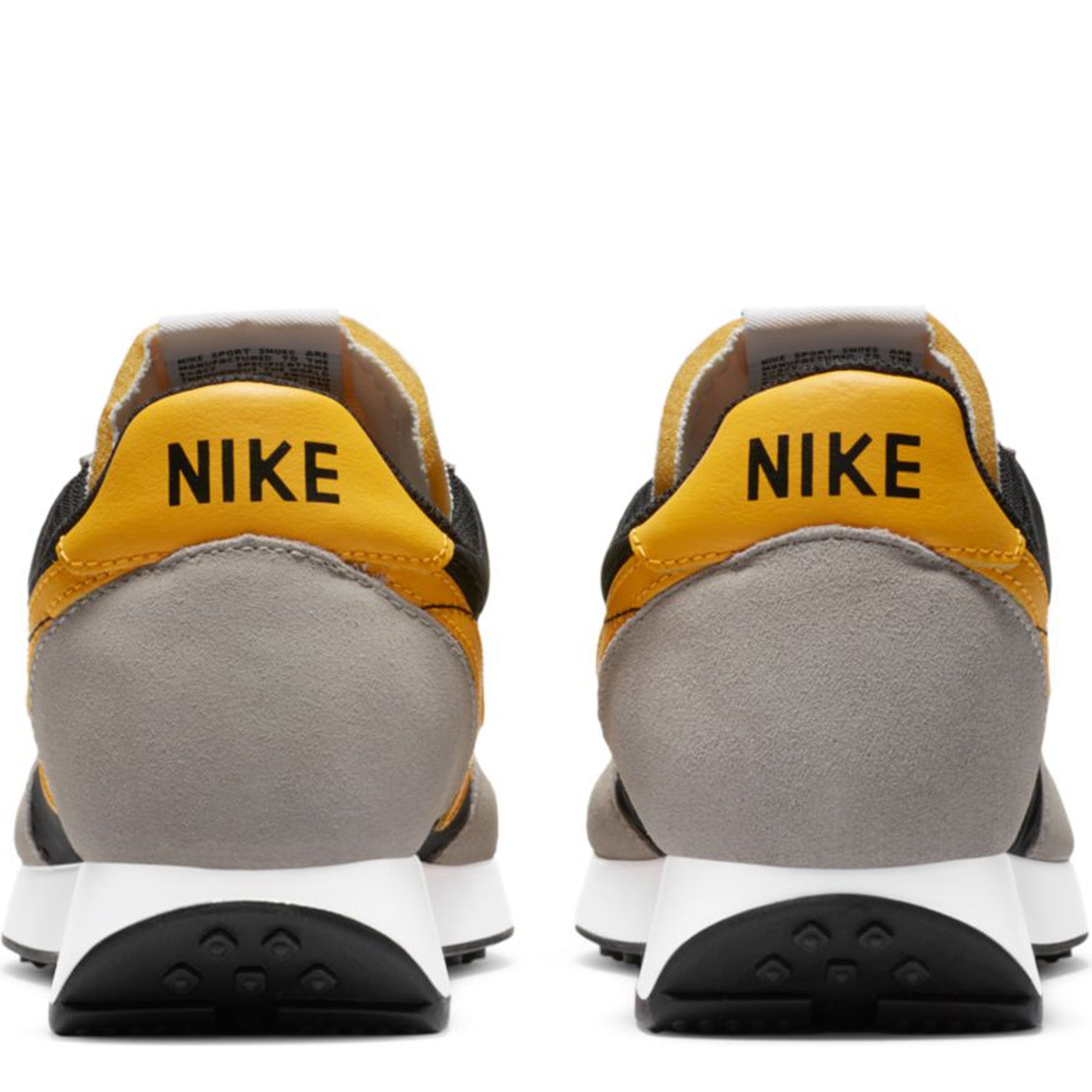 nike tailwind 79 university gold