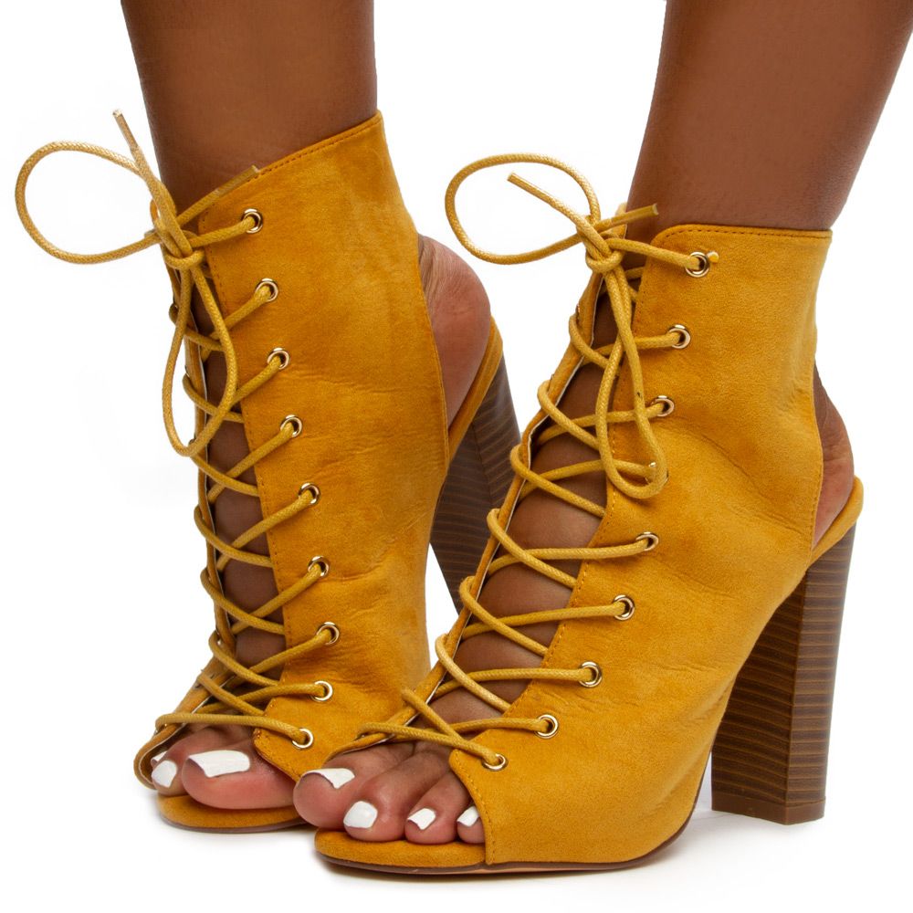 sage green heeled boots