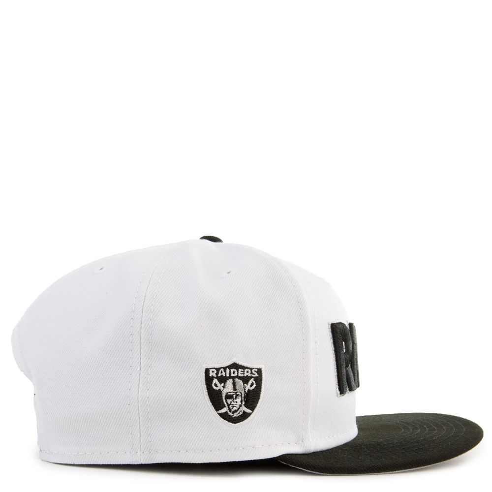 white and black raiders hat