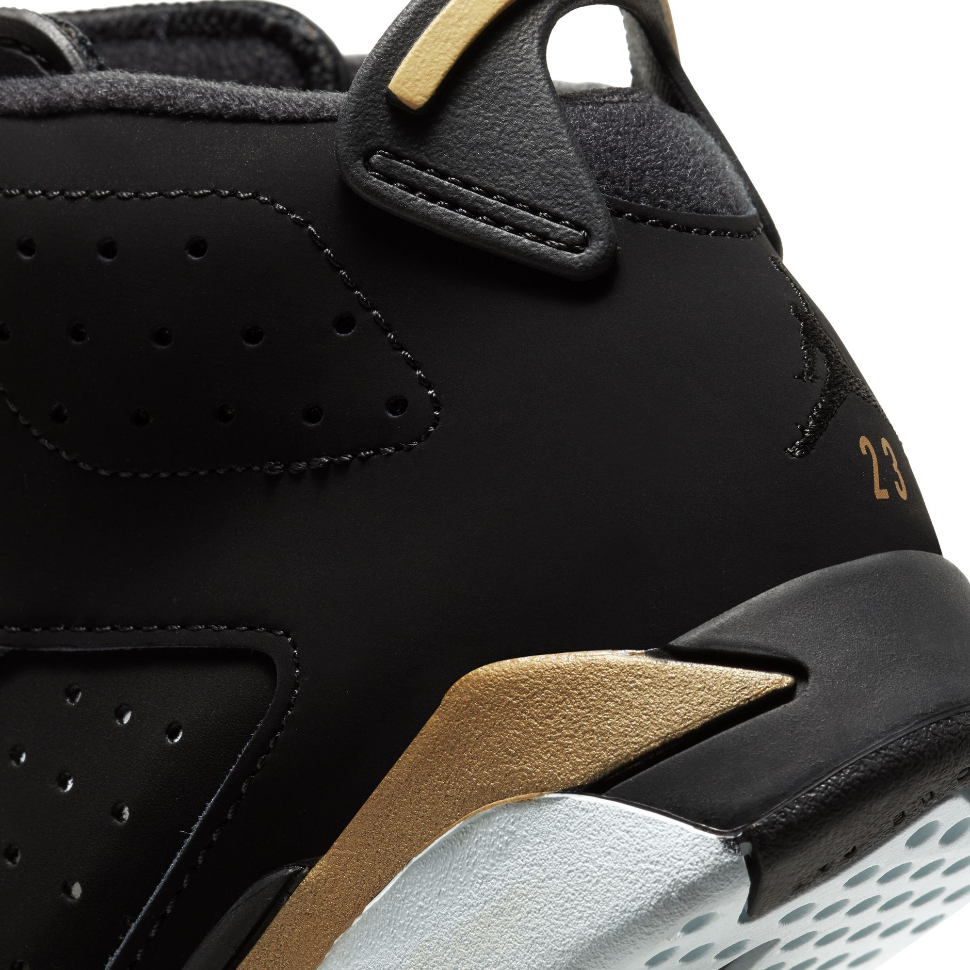 black and gold jordan 6