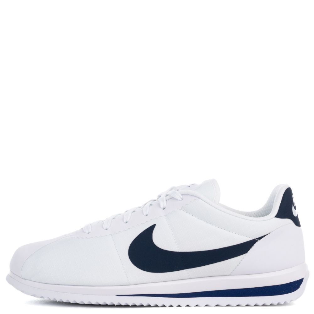 white and navy blue nike