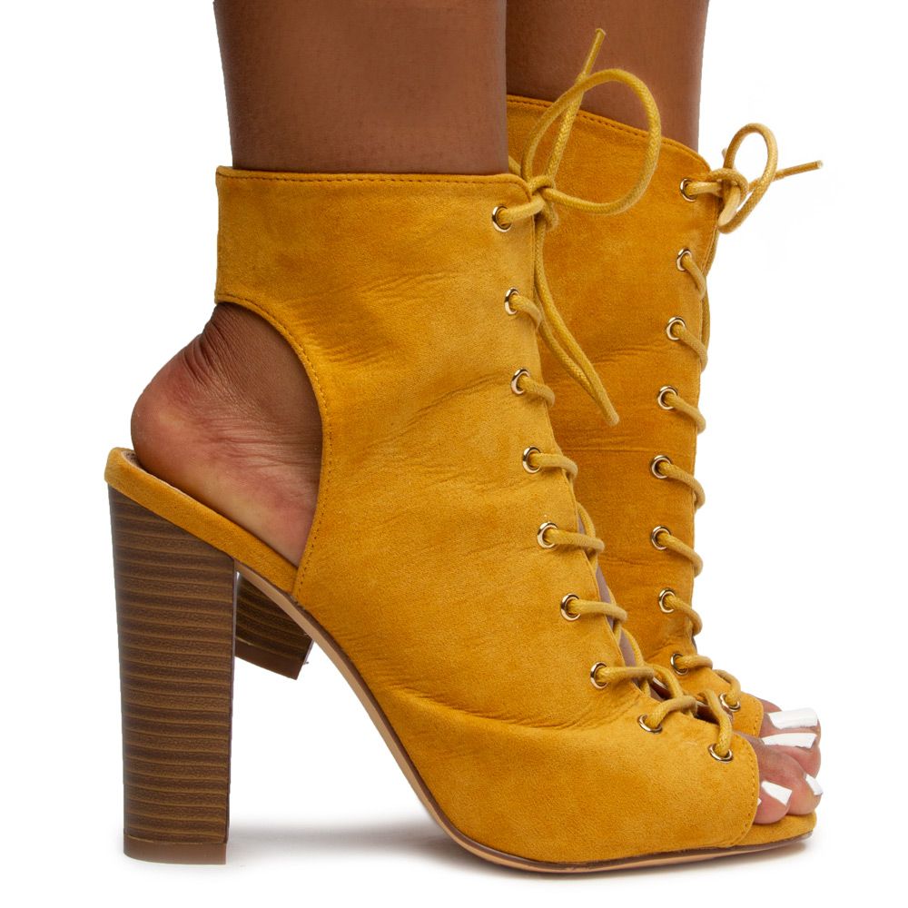 sage green heeled boots