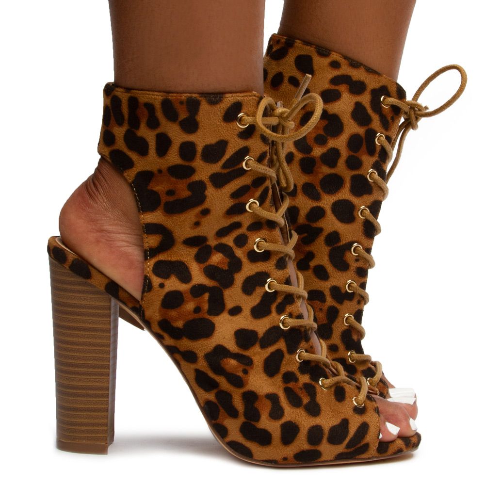 sage green heeled boots