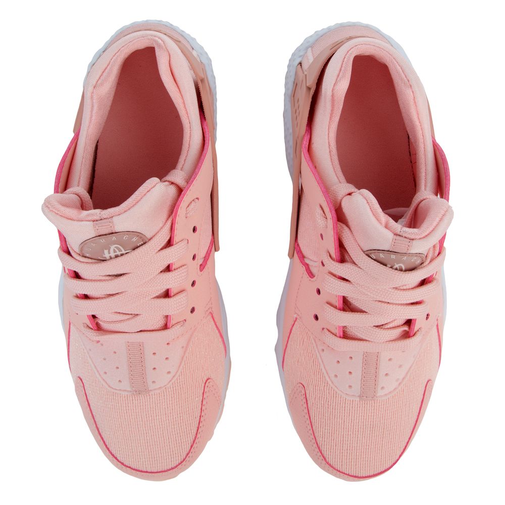 Rust pink nike on sale huarache