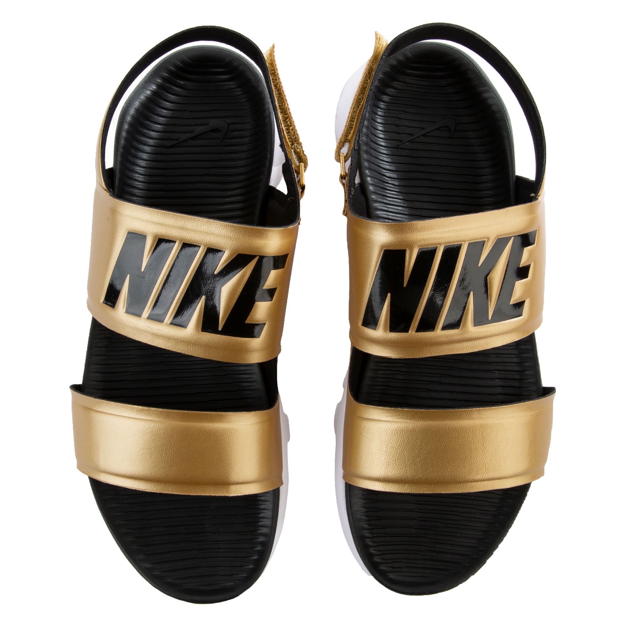 black and gold nike flip flops