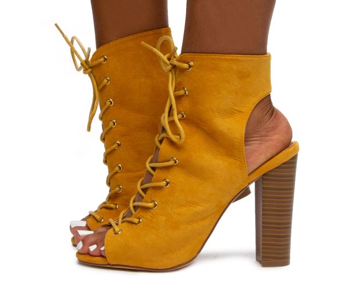 sage green heeled boots