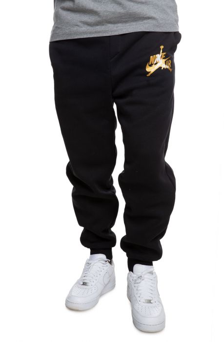 black and gold jordan pants