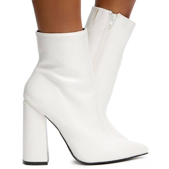 white pointed toe booties