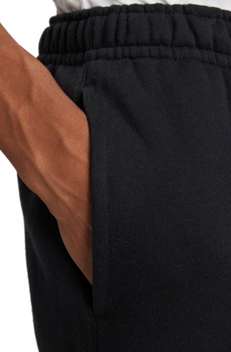 Sportswear Club Stories sweatpants Black/University Red