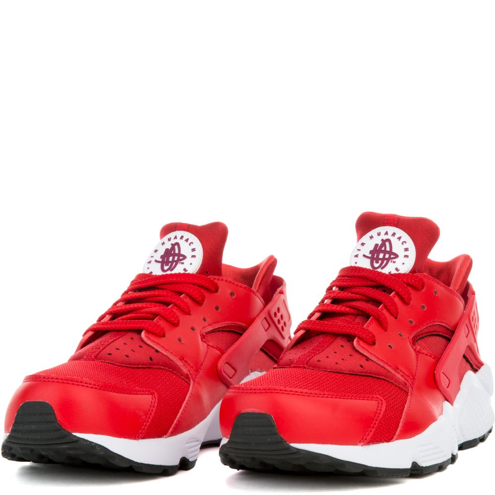 red huaraches with white bottoms