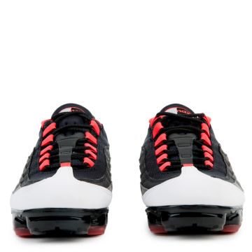 all white vapormax with red bottoms