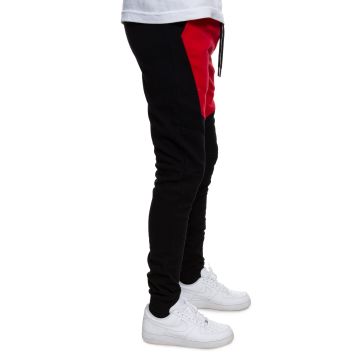 red nike tech joggers